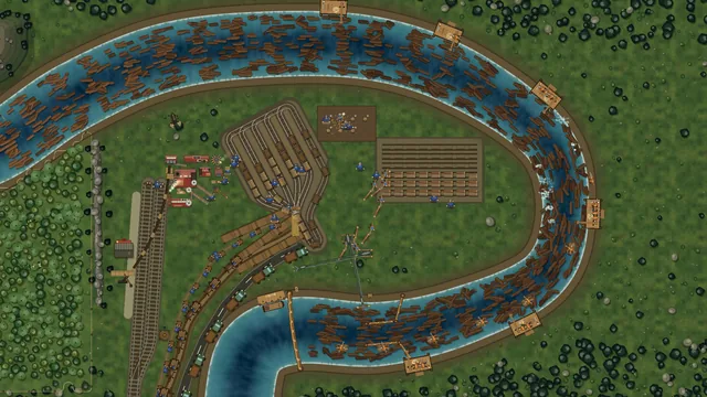 A hairpin bend packed with logs, the wood yard in the loop
